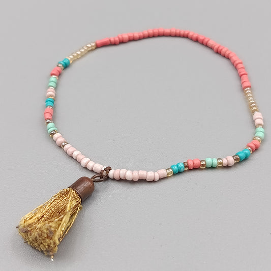 Buntes Perlen Elastikarmband mit Quaste – Verspielter Schmuck
