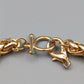 Elegantes Goldfarbenes Panzerarmband – Massives Design