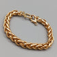 Elegantes Goldfarbenes Panzerarmband – Massives Design