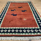 Indischer Gabbeh Teppich Handgeknüpft Rostrot Tiermotive 150x93 cm