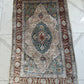 Orientteppich handgeknüpft Hereke 145x85 cm Seide auf Seide