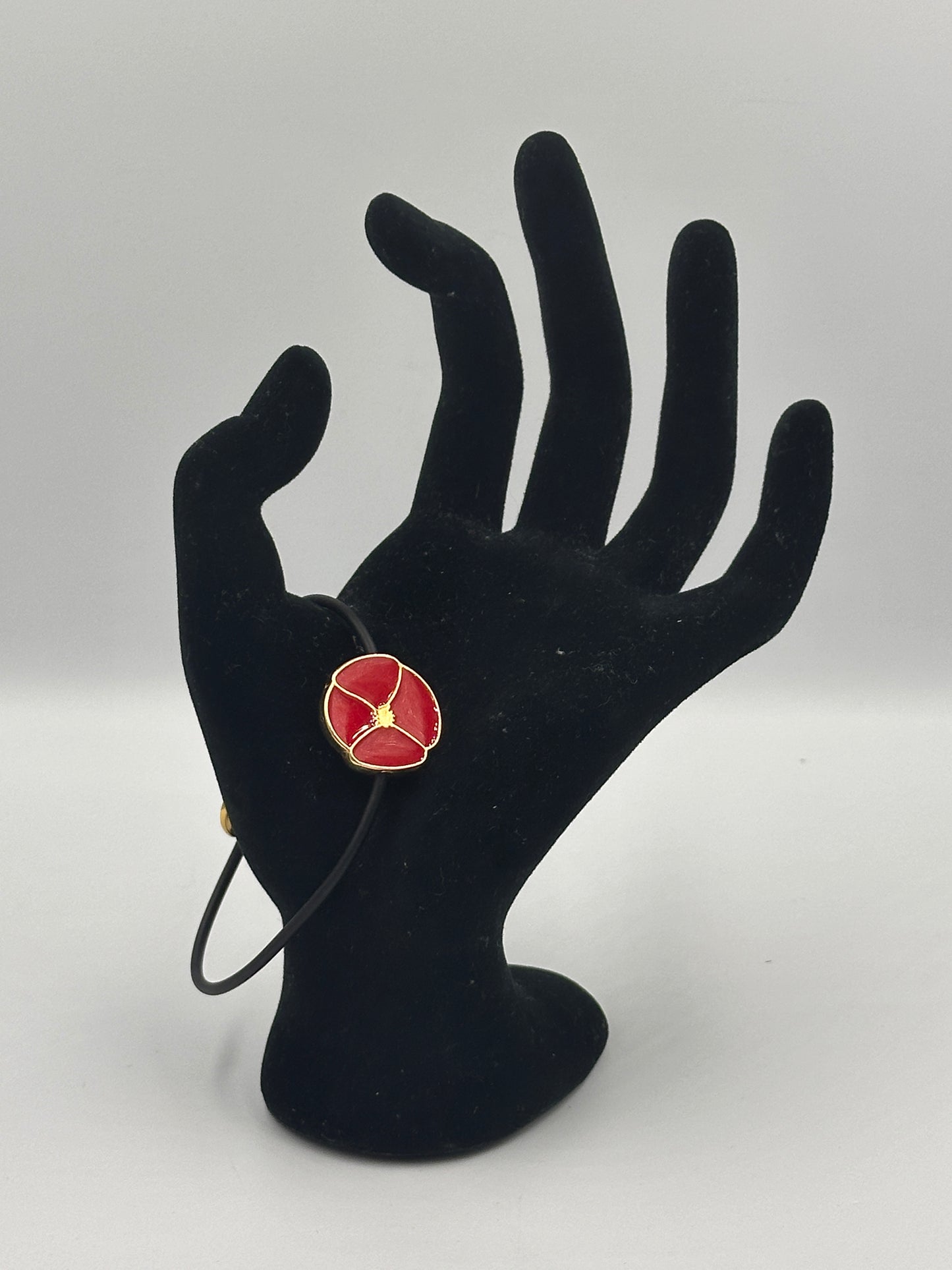 Kenzo Armband Schwarz mit Rot und Goldfarbenen Akzenten