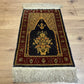 Orientteppich handgeknüpft Hereke Seide 74x45 cm