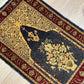 Orientteppich handgeknüpft Hereke Seide 74x45 cm