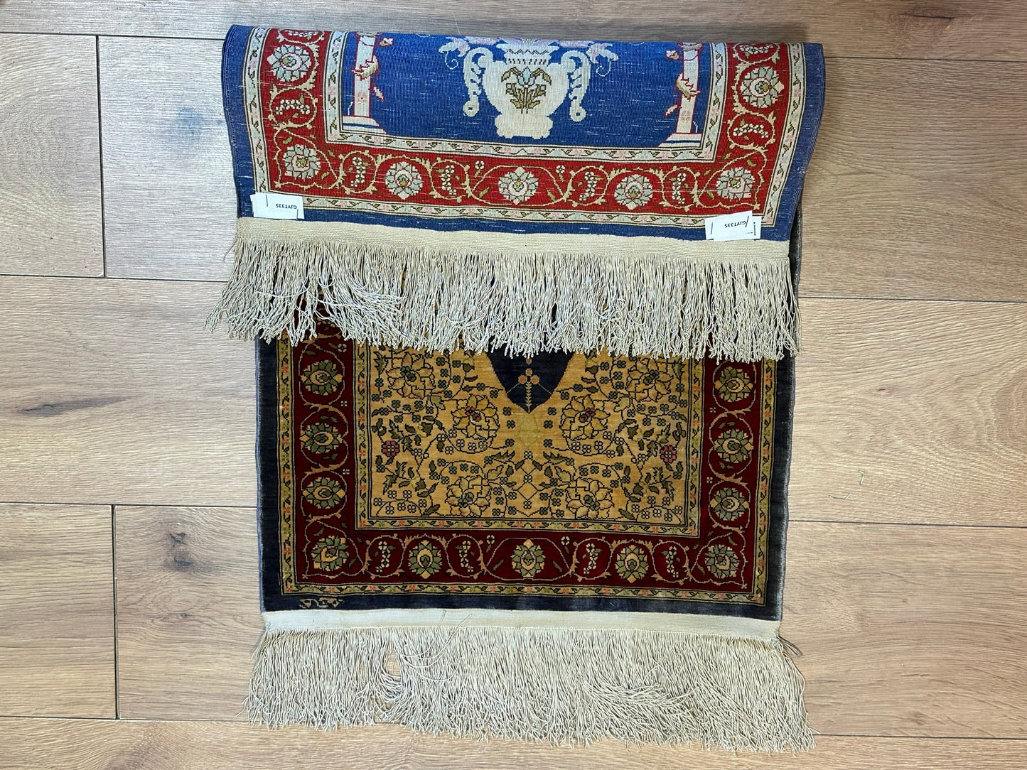 Orientteppich handgeknüpft Hereke Seide 74x45 cm