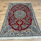 Orientteppich handgeknüpft Nain 127x84 cm Korkwolle Seide