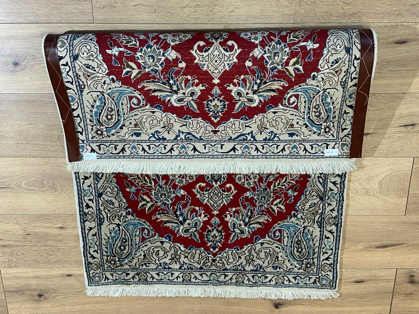 Orientteppich handgeknüpft Nain 127x84 cm Korkwolle Seide