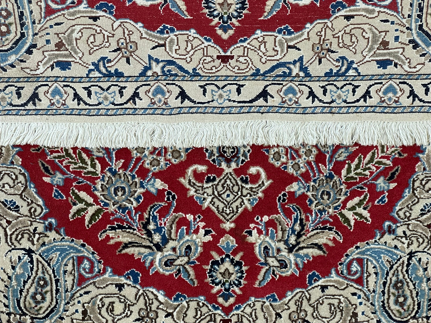 Orientteppich handgeknüpft Nain 127x84 cm Korkwolle Seide