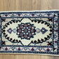 Orientteppich handgeknüpft Nain 58x38 cm