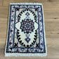 Orientteppich handgeknüpft Nain 58x38 cm