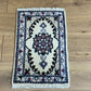 Orientteppich handgeknüpft Nain 58x38 cm