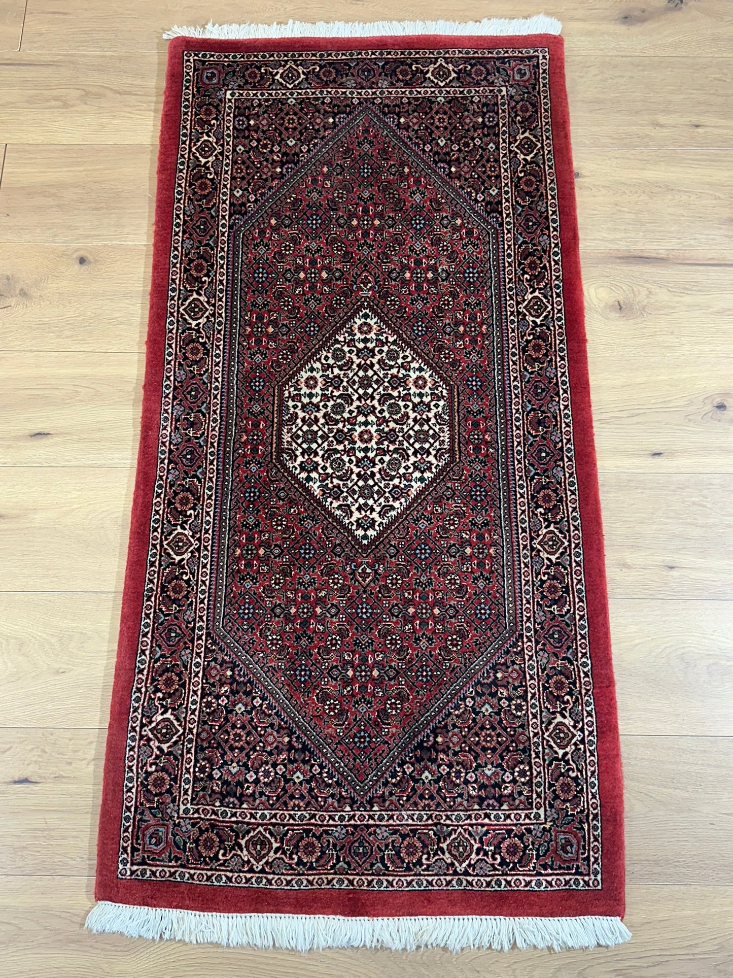 Orientteppich handgeknüpft Bidjar Korkwolle 142x70 cm