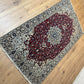 Orientteppich handgeknüpft Nain 220x127 cm mit Seide