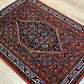 Orientteppich handgeknüpft Bidjar 70x50 cm Medallion
