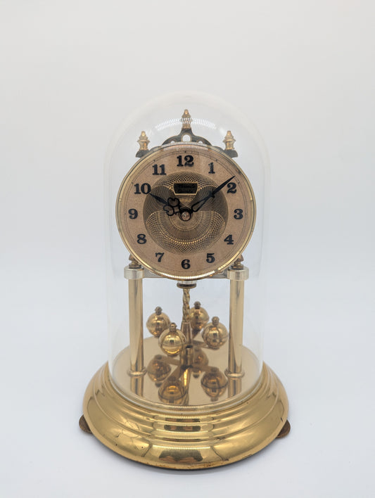 Hermle Kaminuhr Tischuhr mit Drehpendel und Glasdom Quarz Vintage