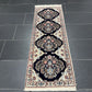 Orientteppich handgeknüpft Nain fein mit Seide 142 × 50 cm