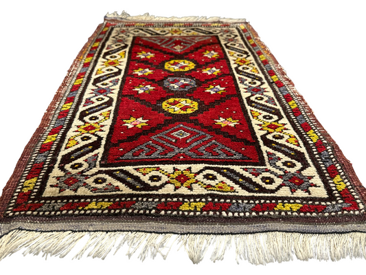 Orientteppich handgeknüpft Yürük Wolle antik Muster 78 × 45 cm