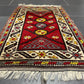Orientteppich handgeknüpft Yürük Wolle antik Muster 78 × 45 cm