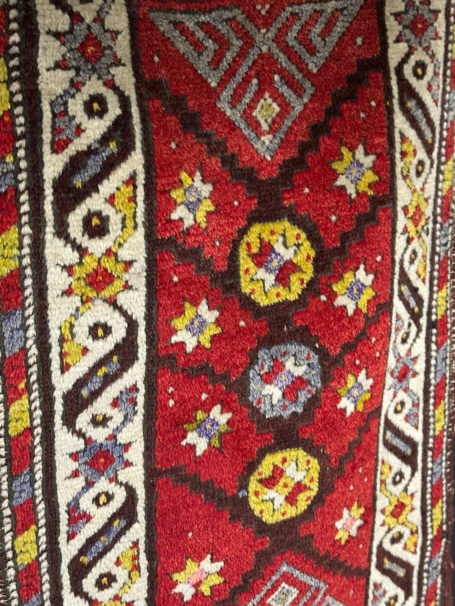 Orientteppich handgeknüpft Yürük Wolle antik Muster 78 × 45 cm