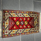 Orientteppich handgeknüpft Yürük Wolle antik Muster 78 × 45 cm