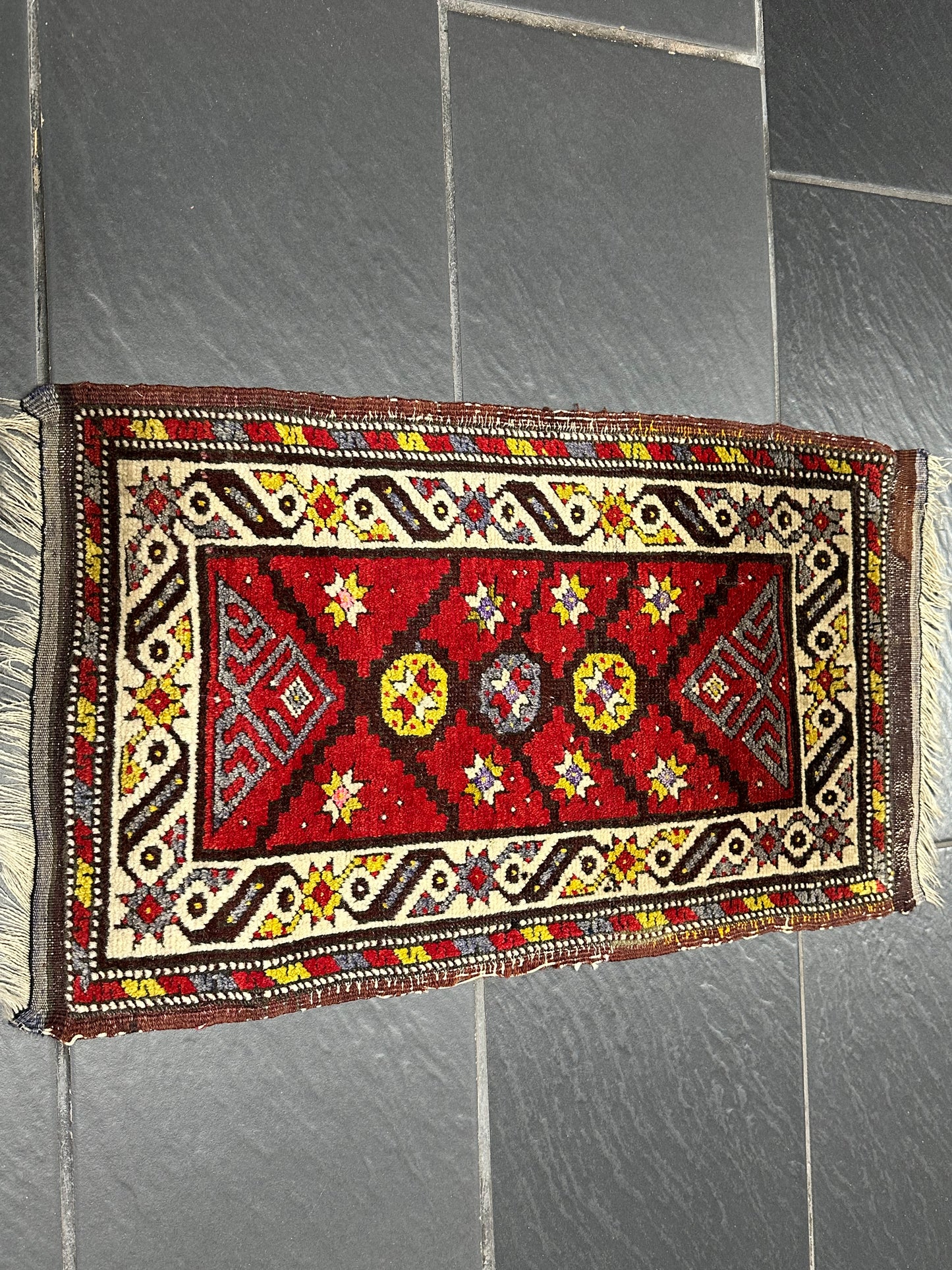 Orientteppich handgeknüpft Yürük Wolle antik Muster 78 × 45 cm