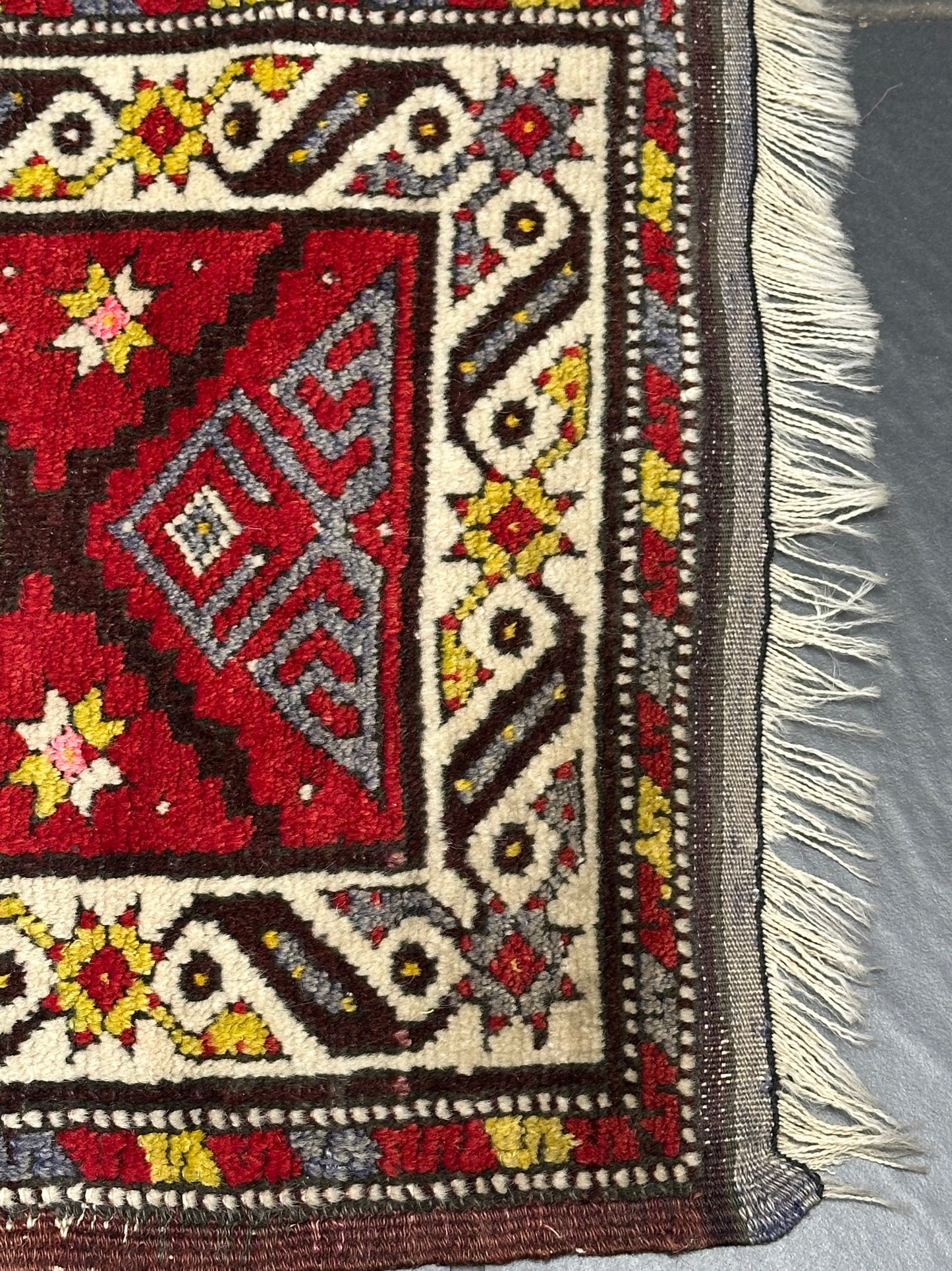 Orientteppich handgeknüpft Yürük Wolle antik Muster 78 × 45 cm