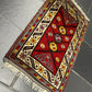Orientteppich handgeknüpft Yürük Wolle antik Muster 78 × 45 cm