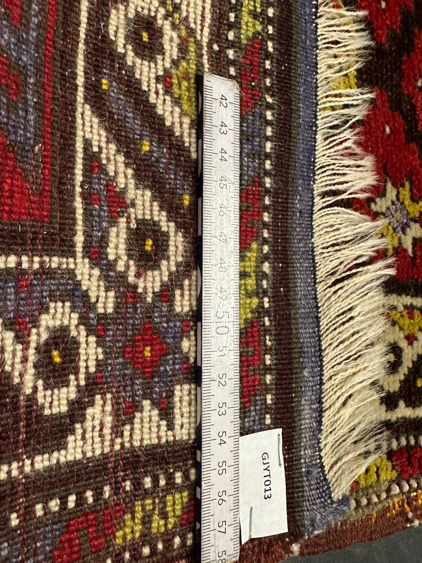 Orientteppich handgeknüpft Yürük Wolle antik Muster 78 × 45 cm
