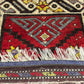 Orientteppich handgeknüpft Yürük Wolle antik Muster 78 × 45 cm
