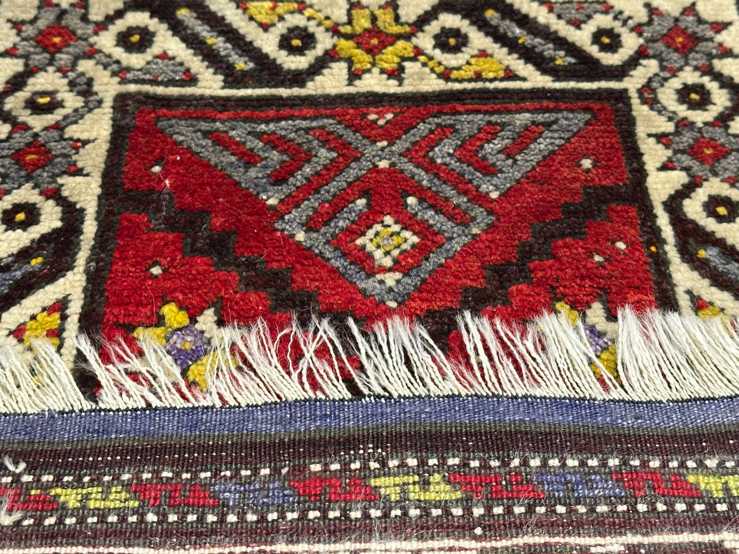 Orientteppich handgeknüpft Yürük Wolle antik Muster 78 × 45 cm