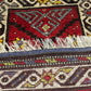 Orientteppich handgeknüpft Yürük Wolle antik Muster 78 × 45 cm